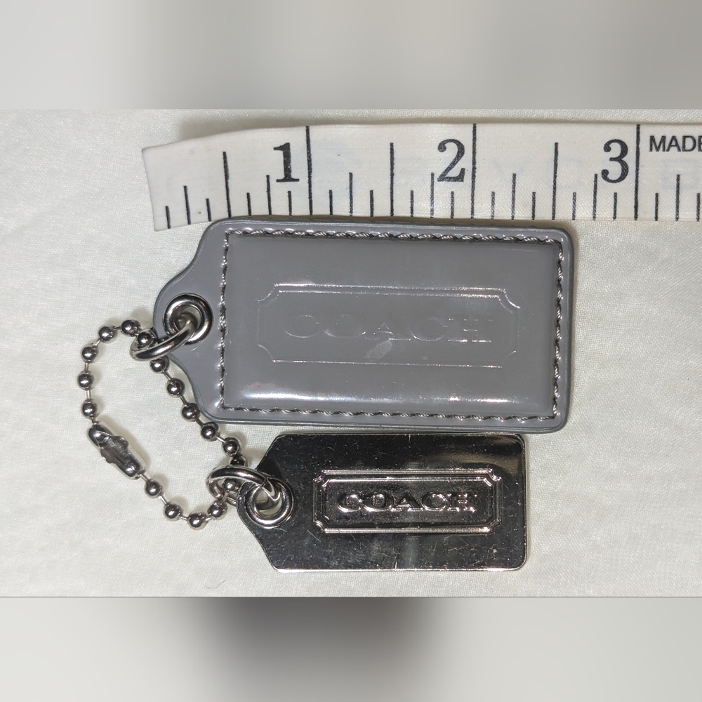 Coach Silver Metal And Patent Leather Gray Hang Tag Bag Charm Set GUC